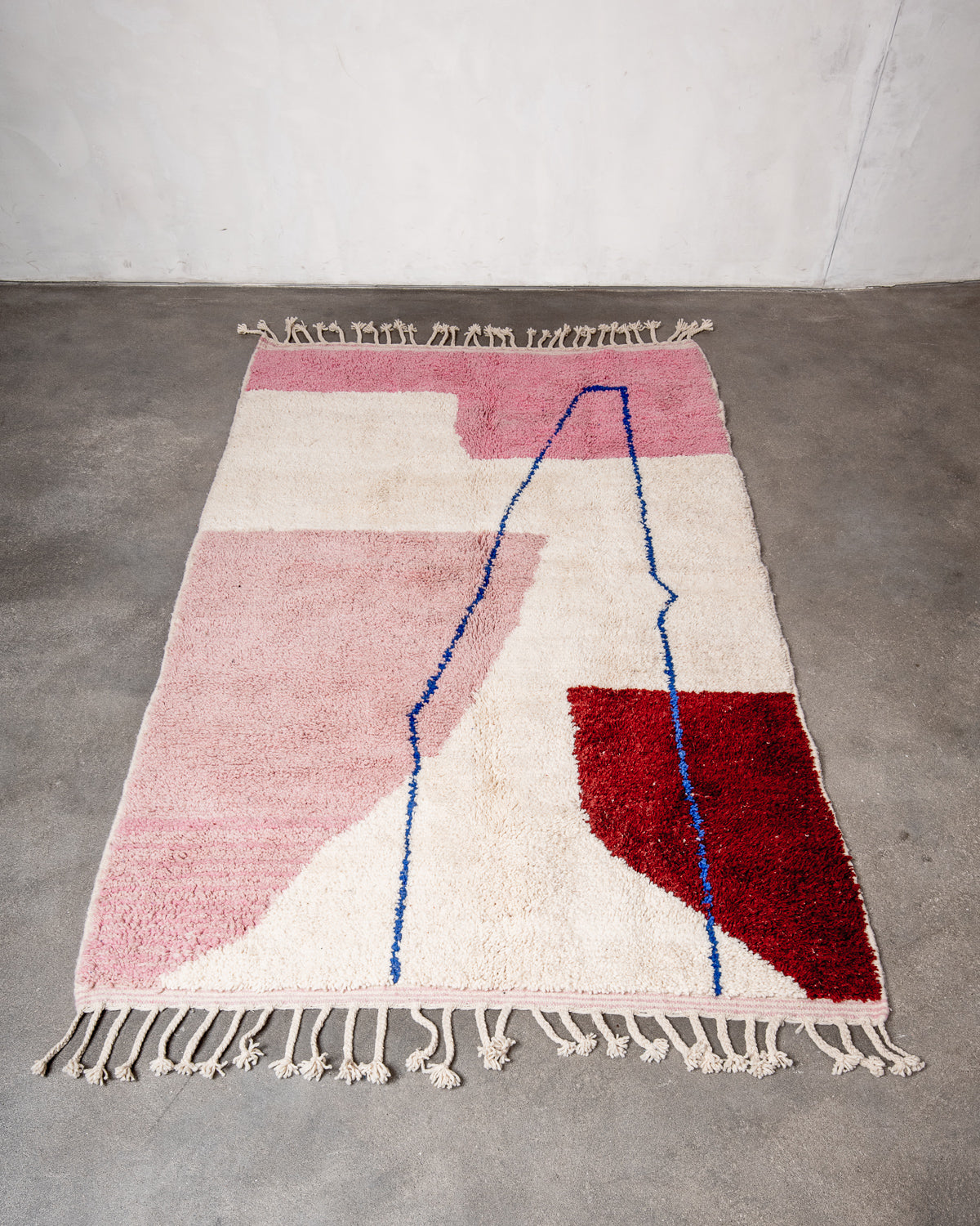 Modern, designer, handcrafted Berber rug from Morocco. Beniourain carpet with beautiful colours and patterns and fluffy wool texture.